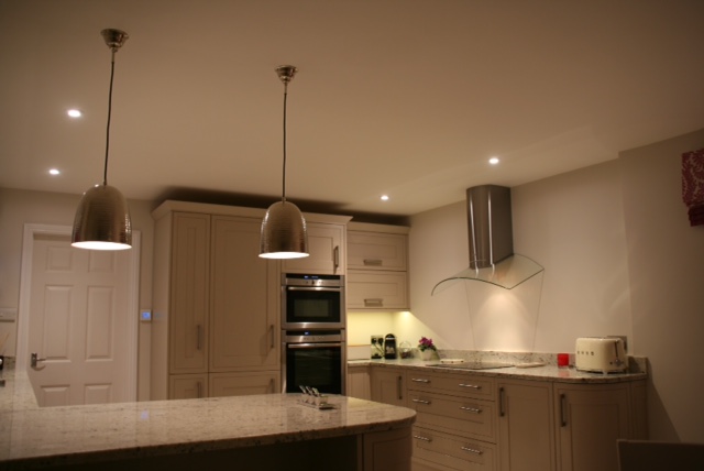 Kitchen with downlights and pendant lighting